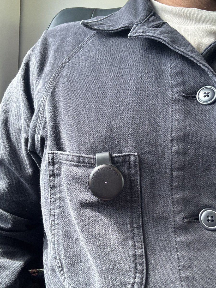 a limitless pendant hanging out of my pocket